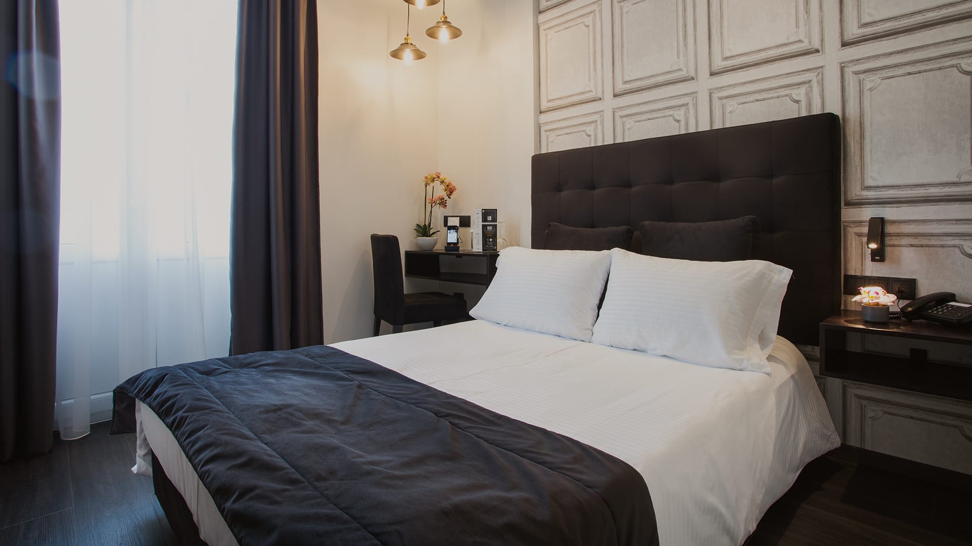 a bed with white sheets