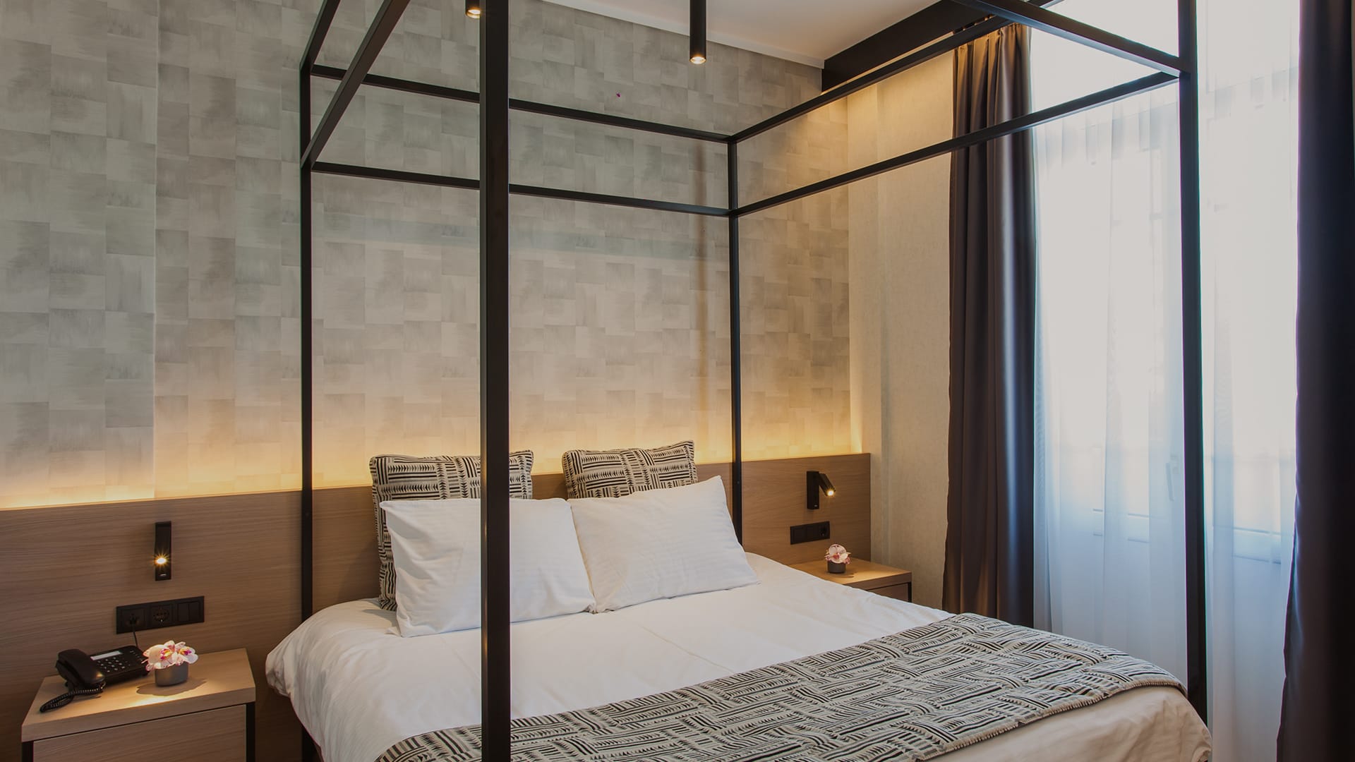 a bed with a white bed spread