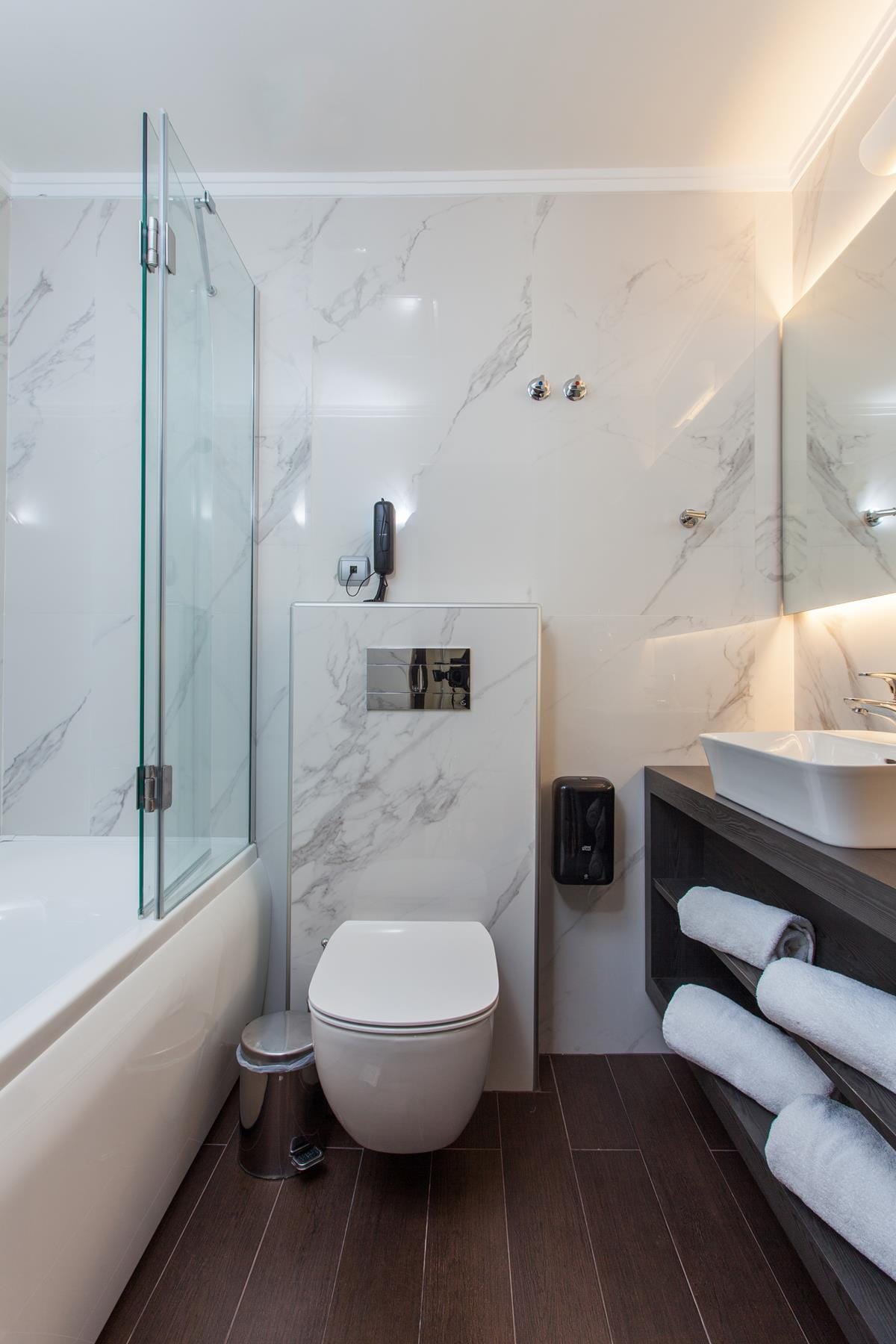 a bathroom with a toilet and sink