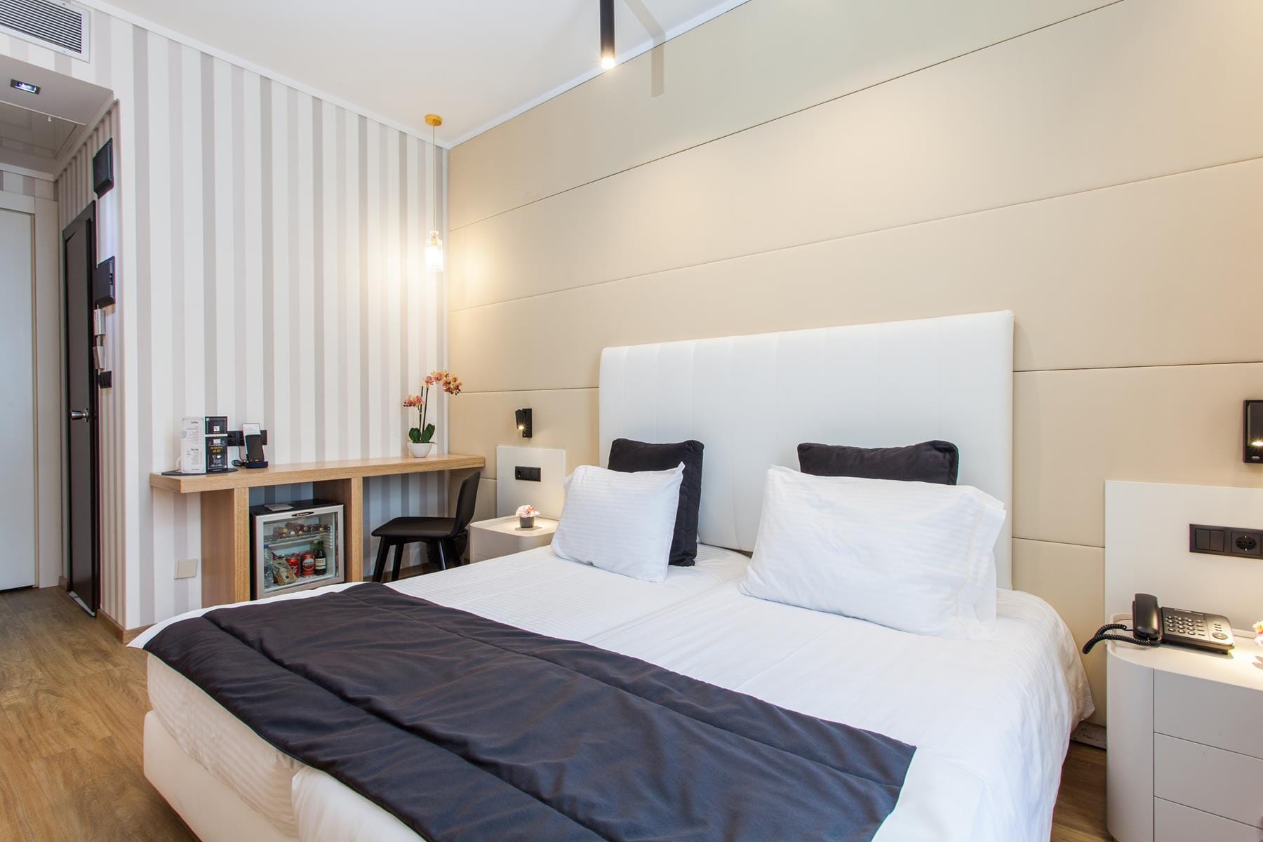 a bed with a blue blanket