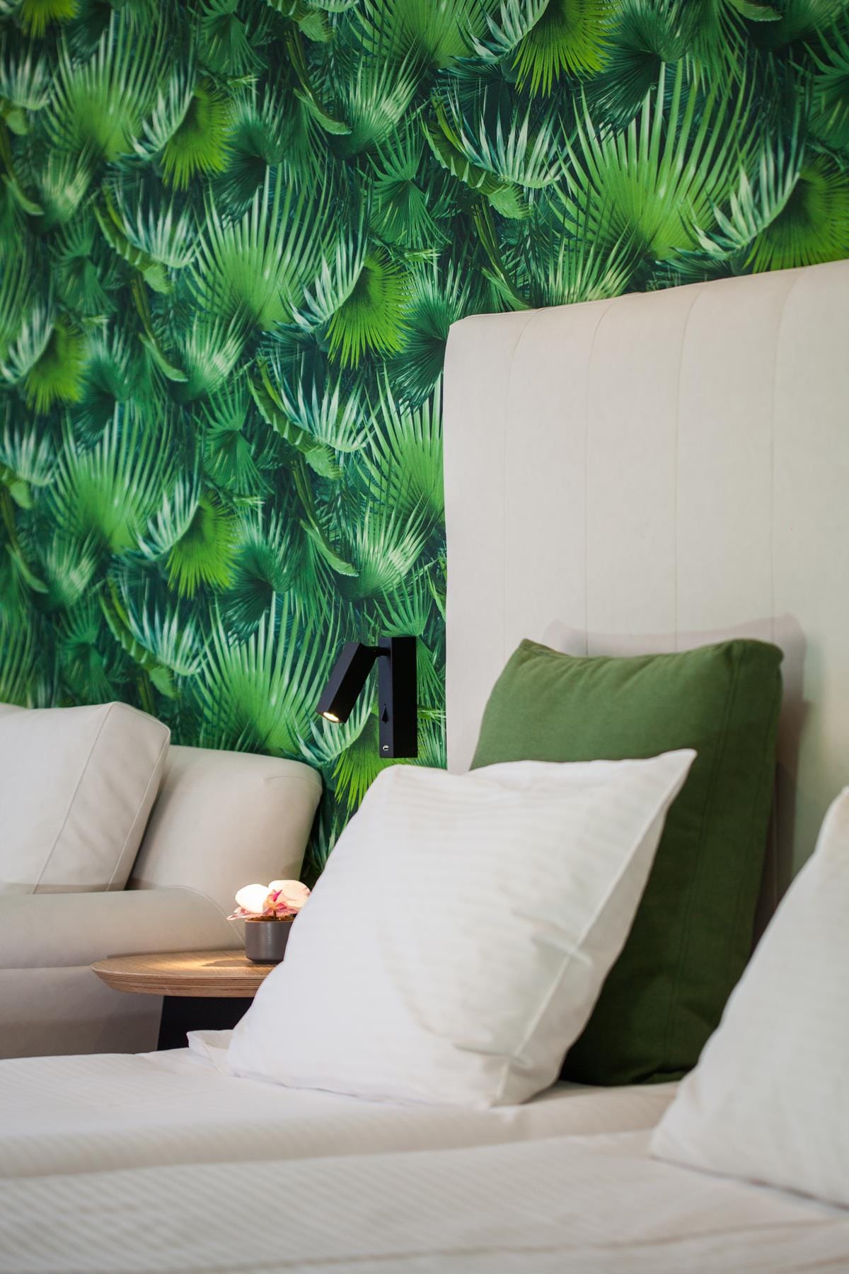 a couch with pillows and a table