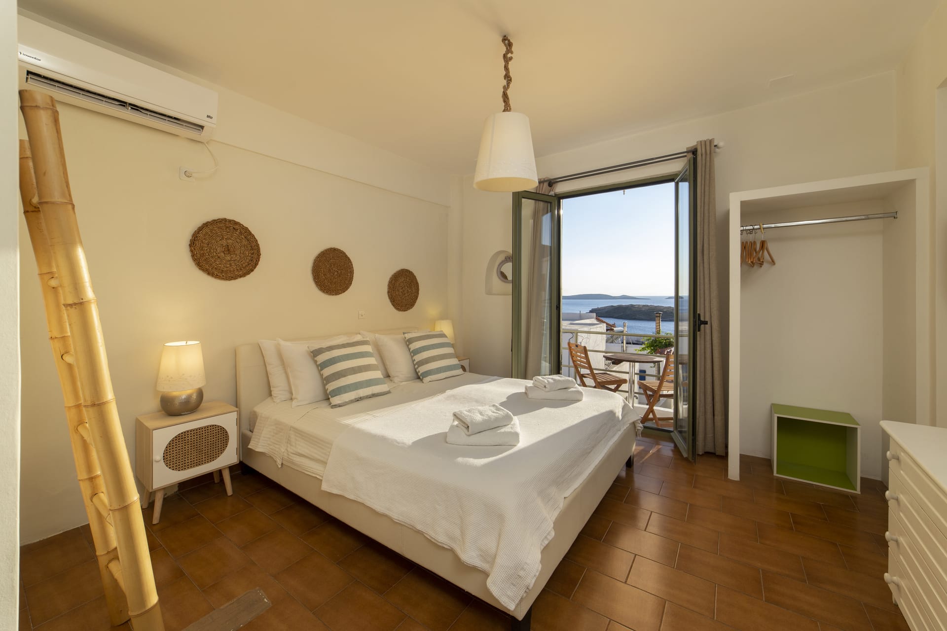 a bedroom with a large window