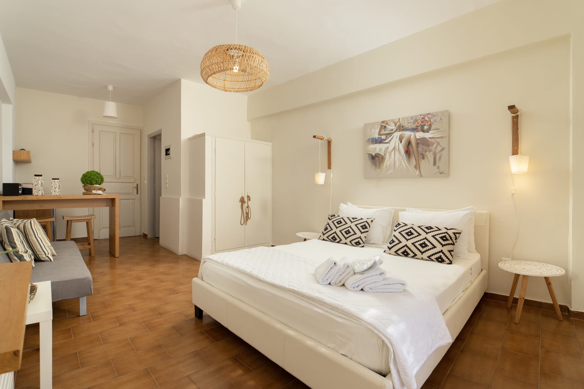 a room with a bed and a desk