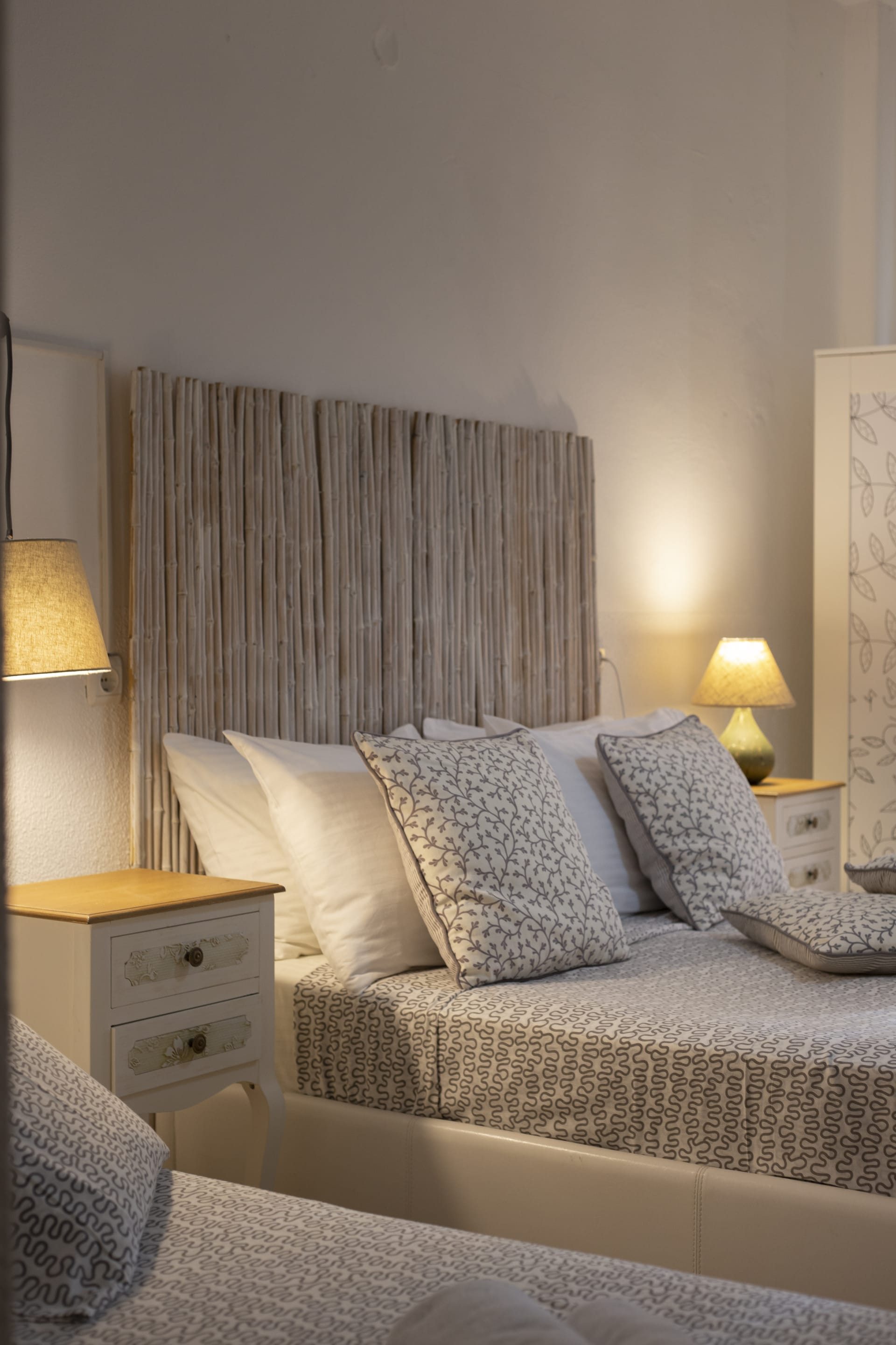 a bed with a white bed spread