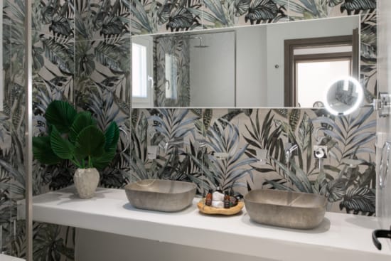 a group of plants in a glass case