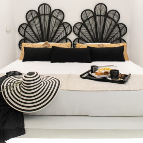 a white shelf with a variety of objects on it