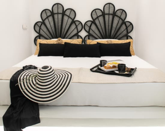 a white shelf with a variety of objects on it