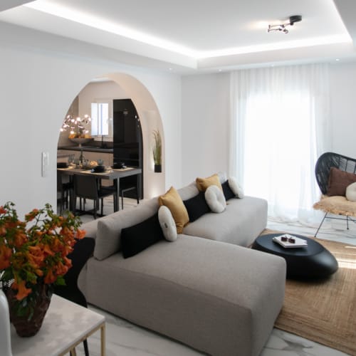 a living room with a couch and a table