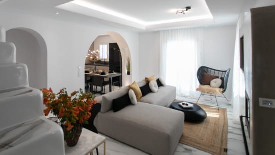 a living room with a couch and a table