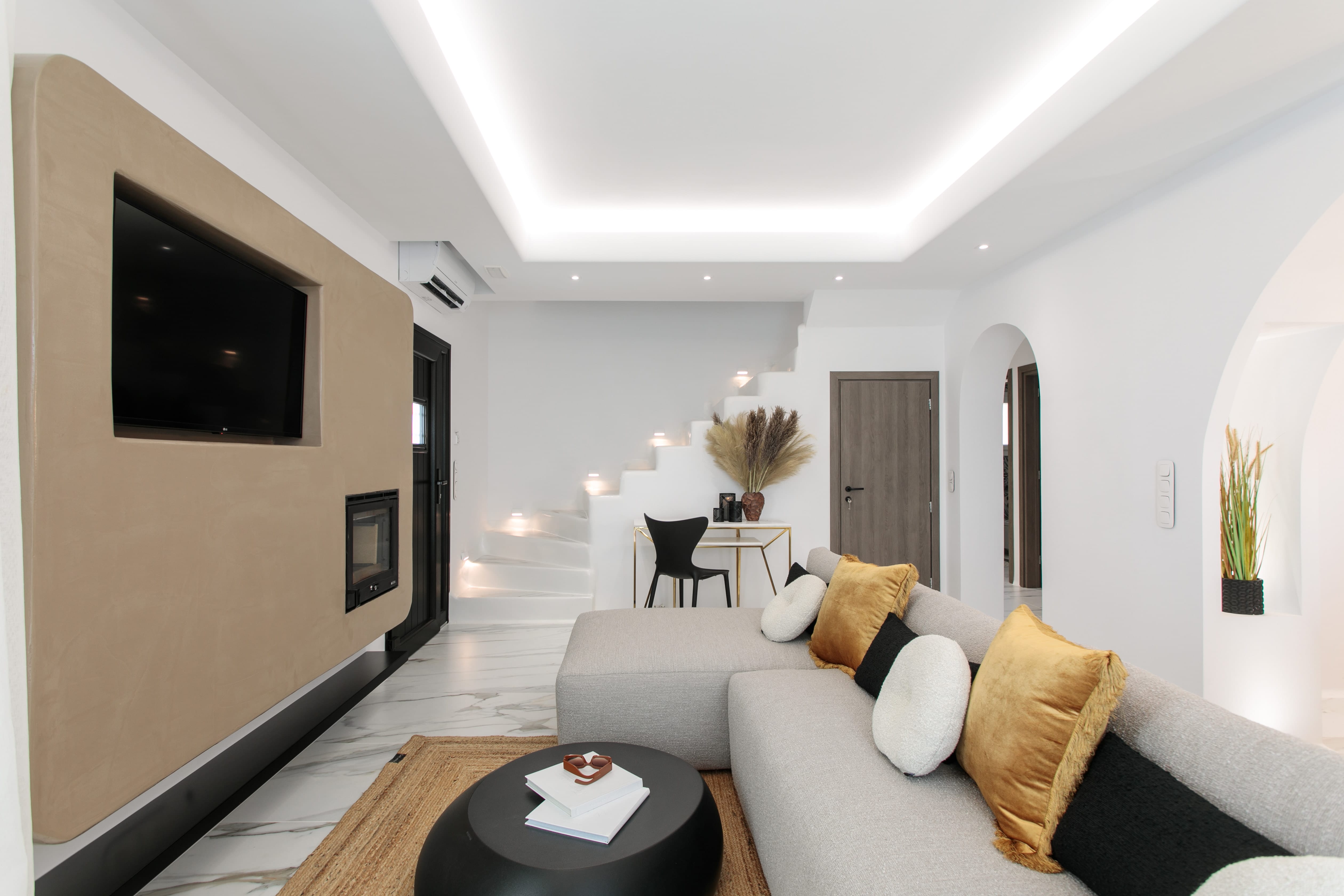 a living room with a couch and a table