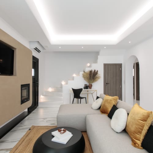 a living room with a couch and a table