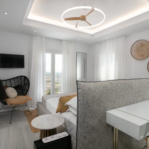 a room with a bed and a table