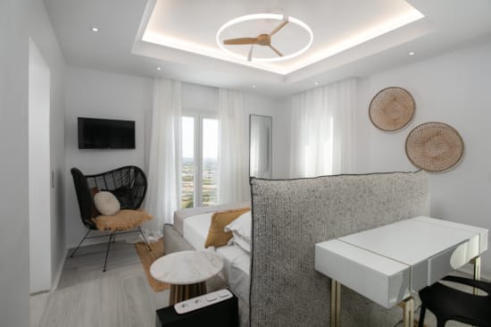 a room with a bed and a table