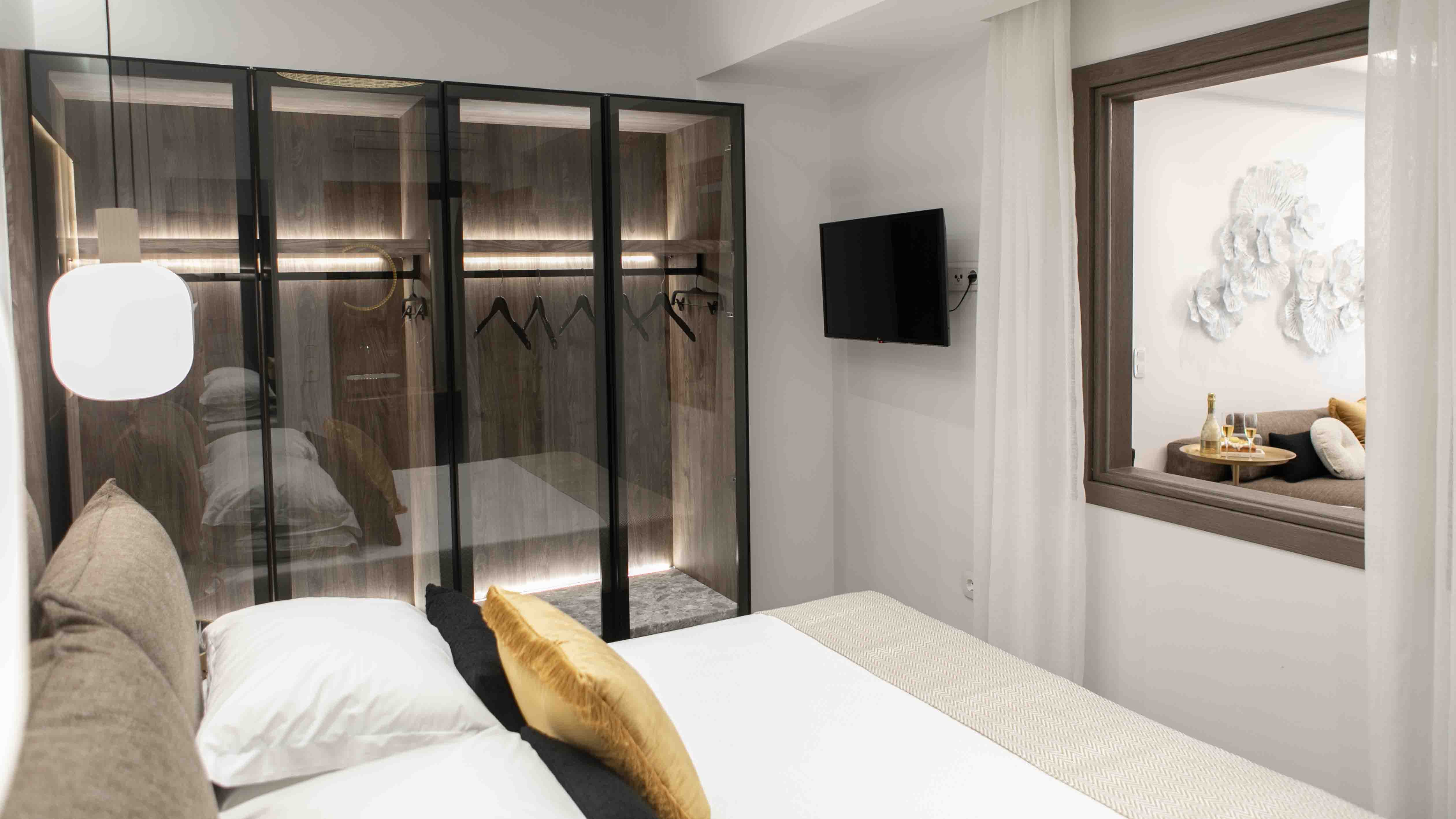 a bed with a glass door