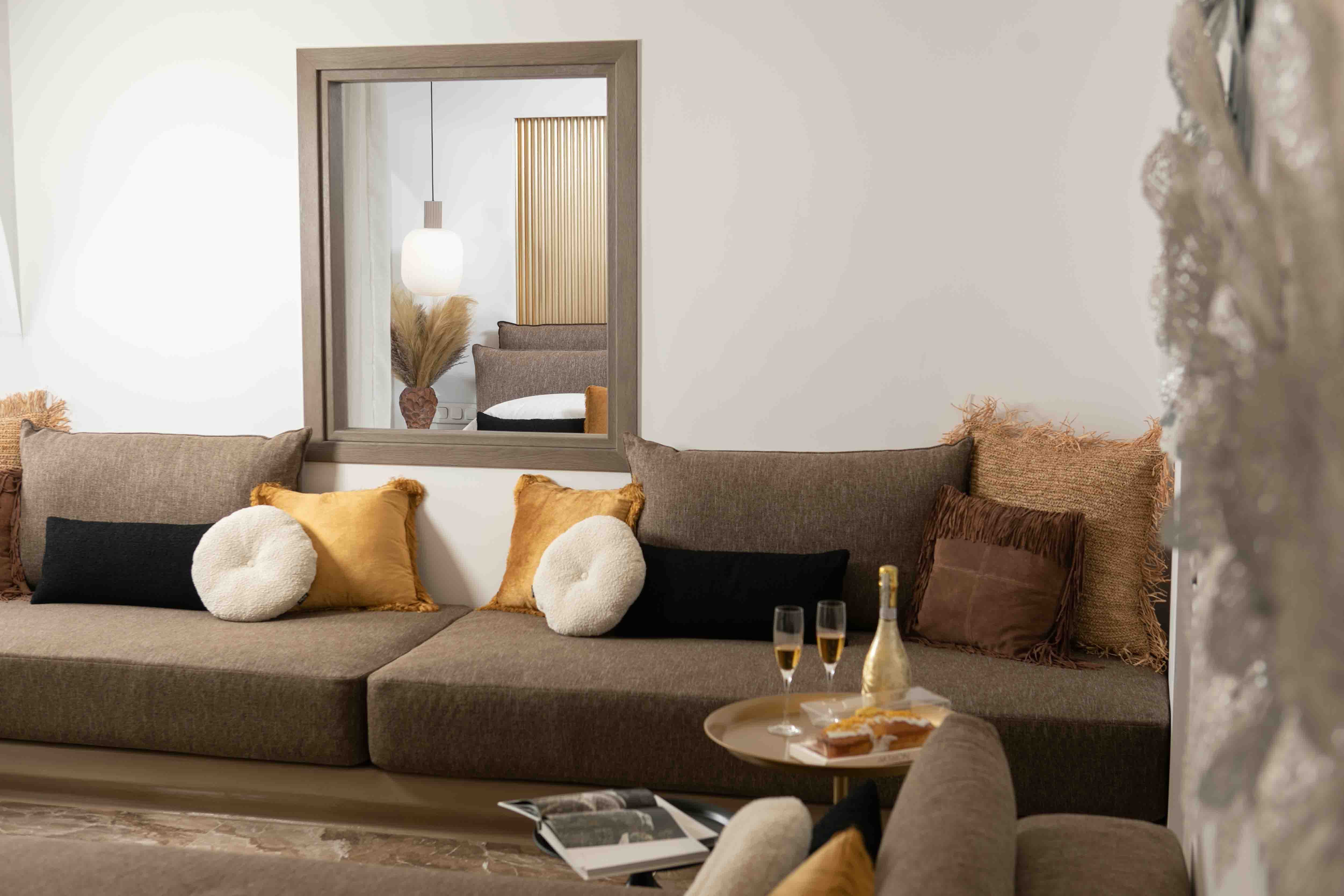 a living room with a couch and a table