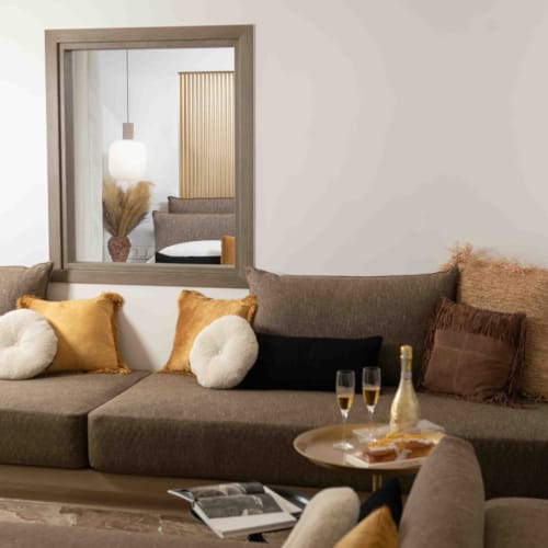 a living room with a couch and a table