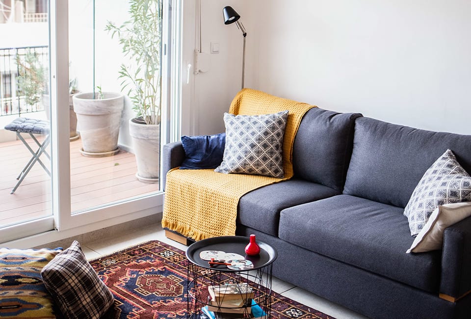 a living room with a couch and a coffee table