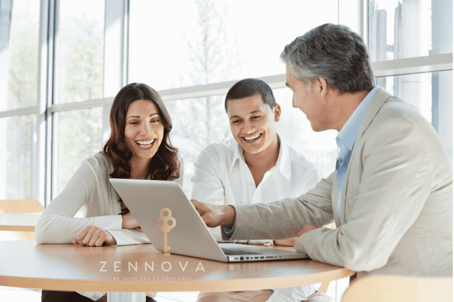 a few people looking at a laptop