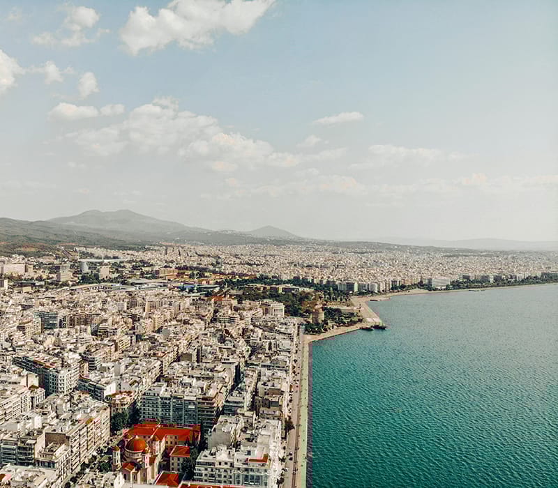 a city next to a body of water