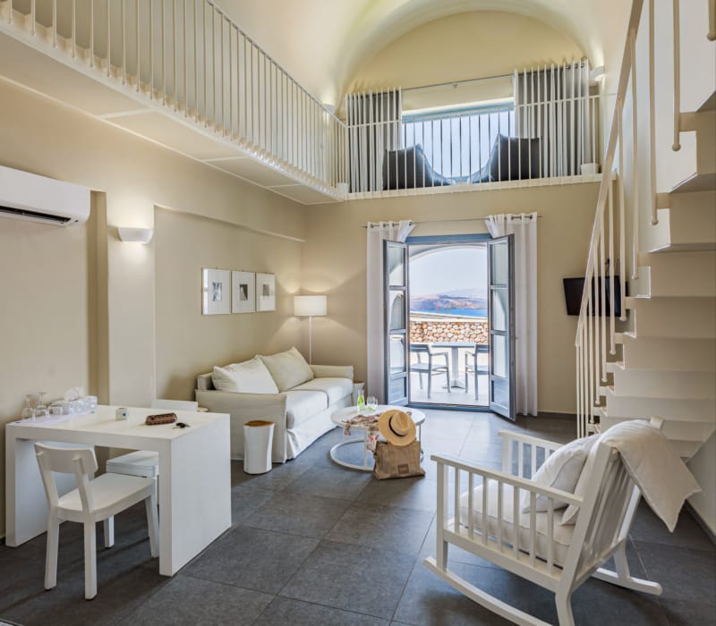 a room with a table and chairs