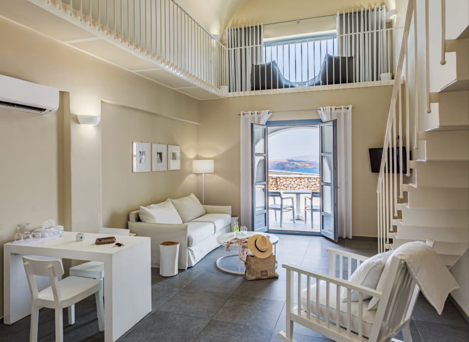 a room with a table and chairs