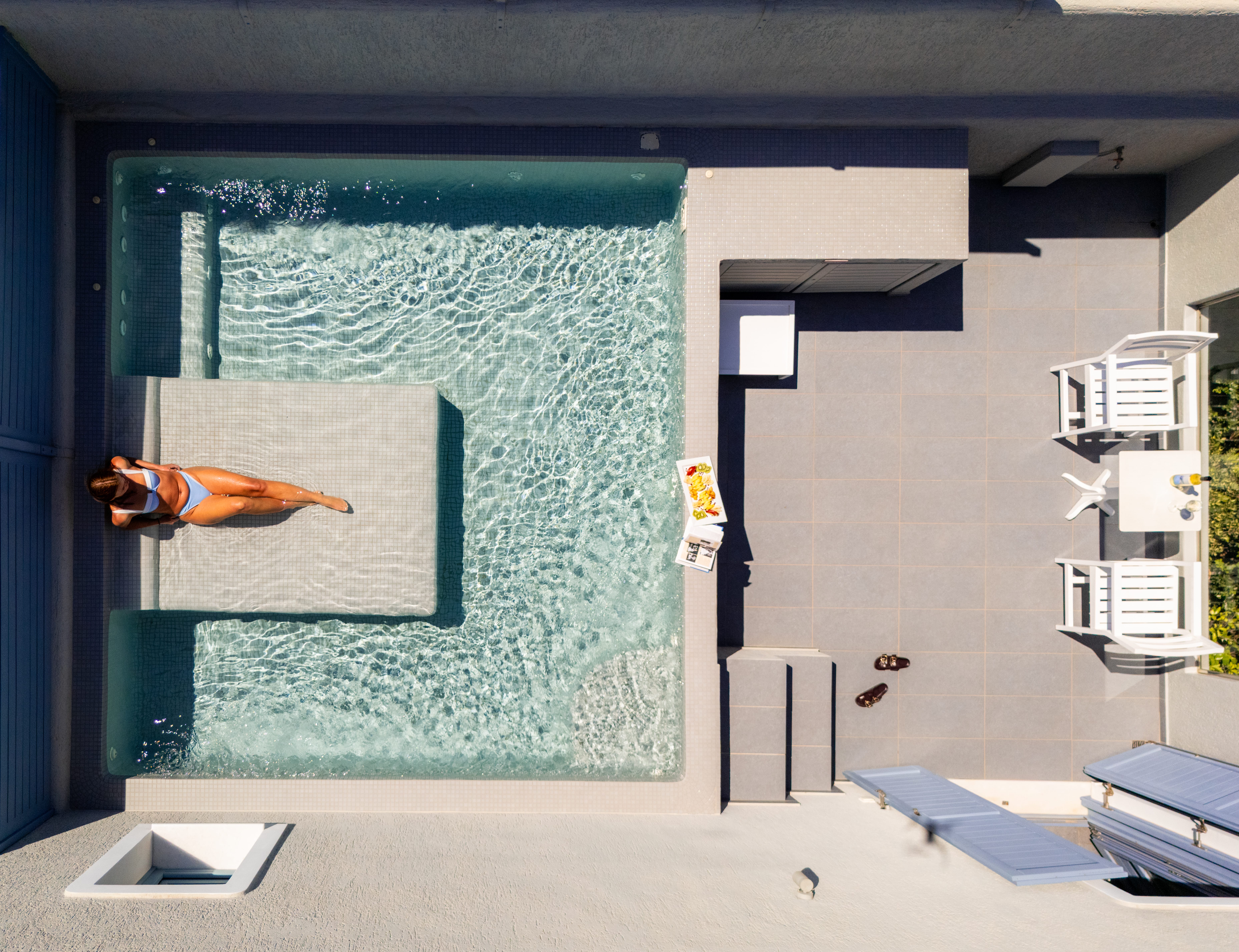 a person in a garment on a pool