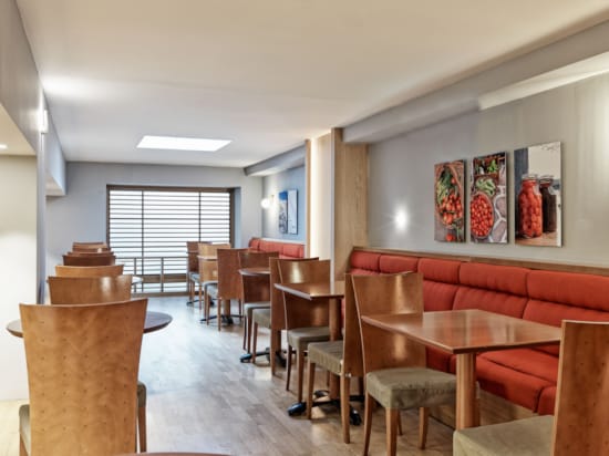 a room with tables and chairs