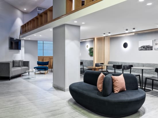 a living room with a couch and a table