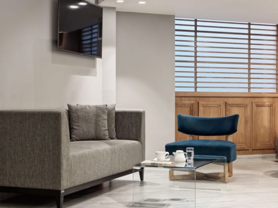 a living room with a couch and a table