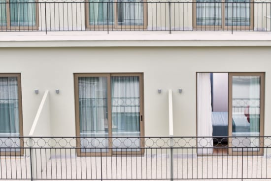 a building with a fence and a gate