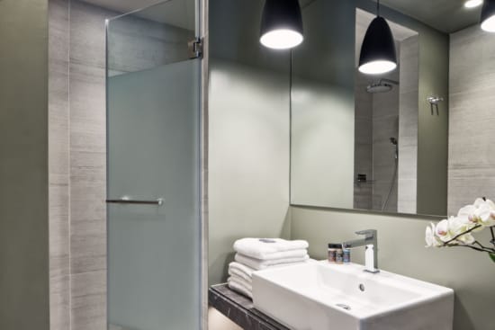 a bathroom with a large mirror