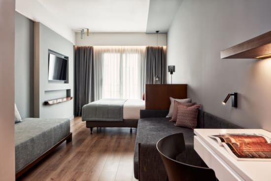 a room with a bed and a couch