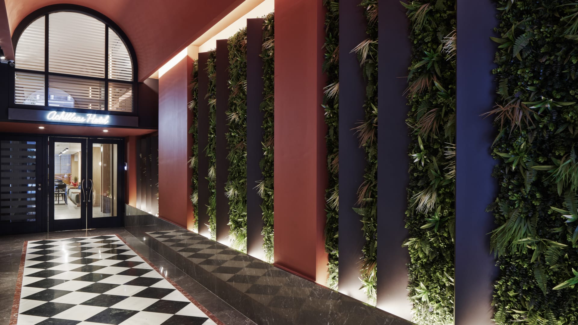 a building with plants in the front