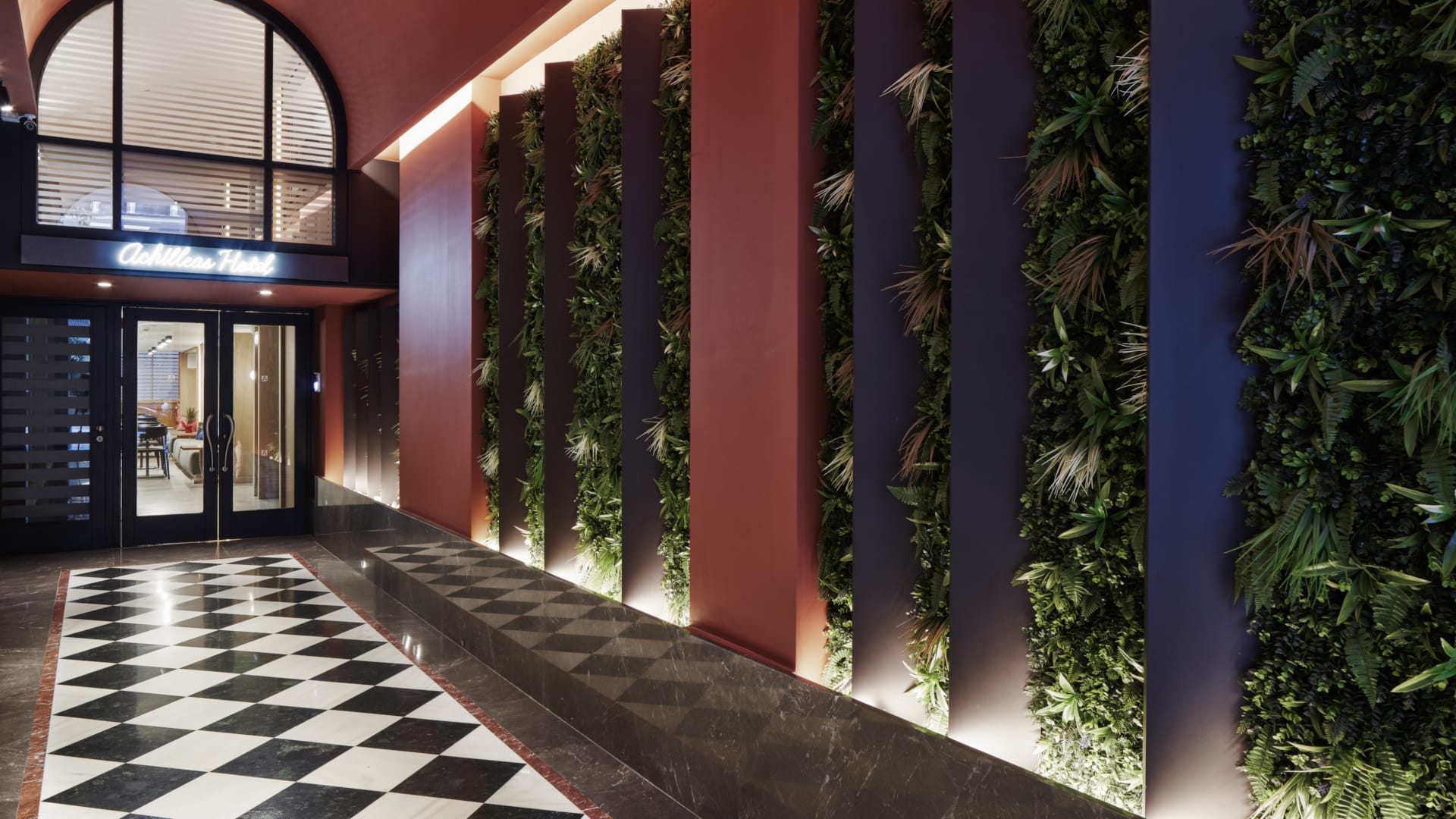 a building with plants in the front