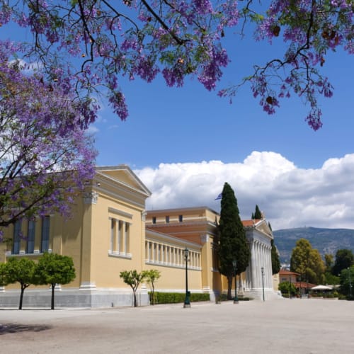 a building with trees in front of it