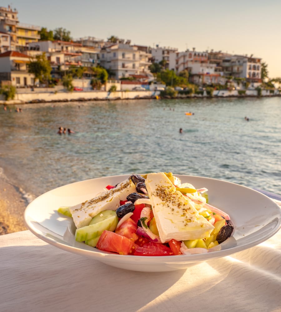 a plate of food on a beach