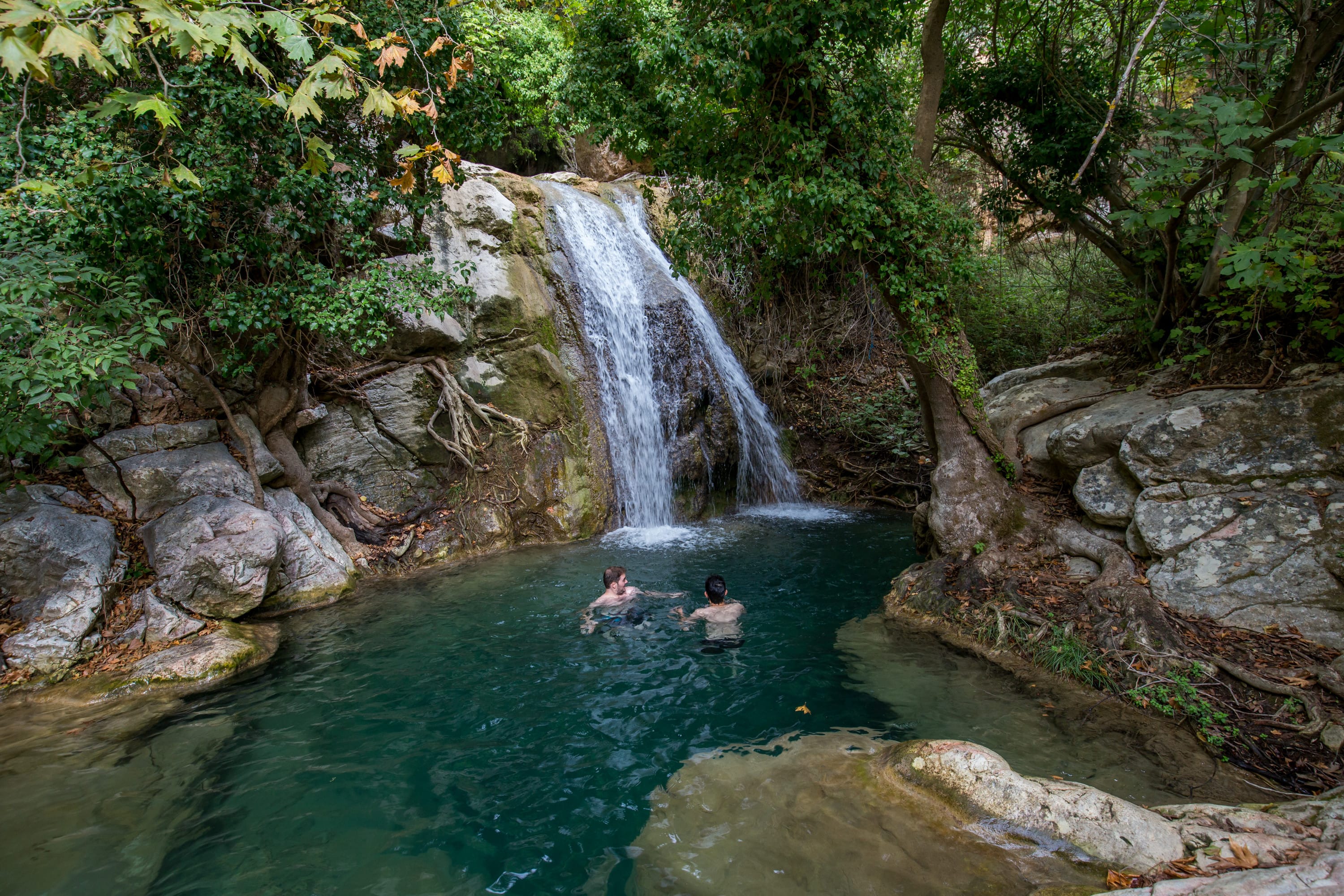 a group of people in a river
