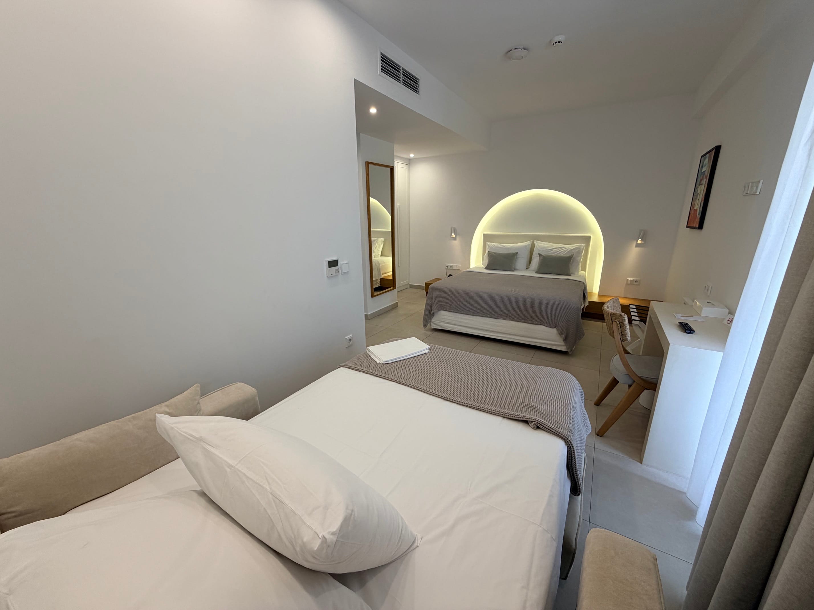 a room with a bed and a chair