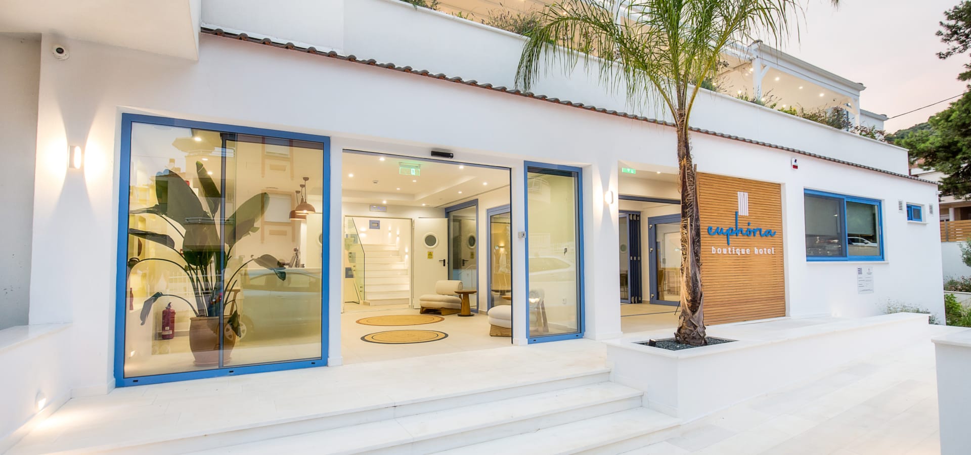 a building with a palm tree