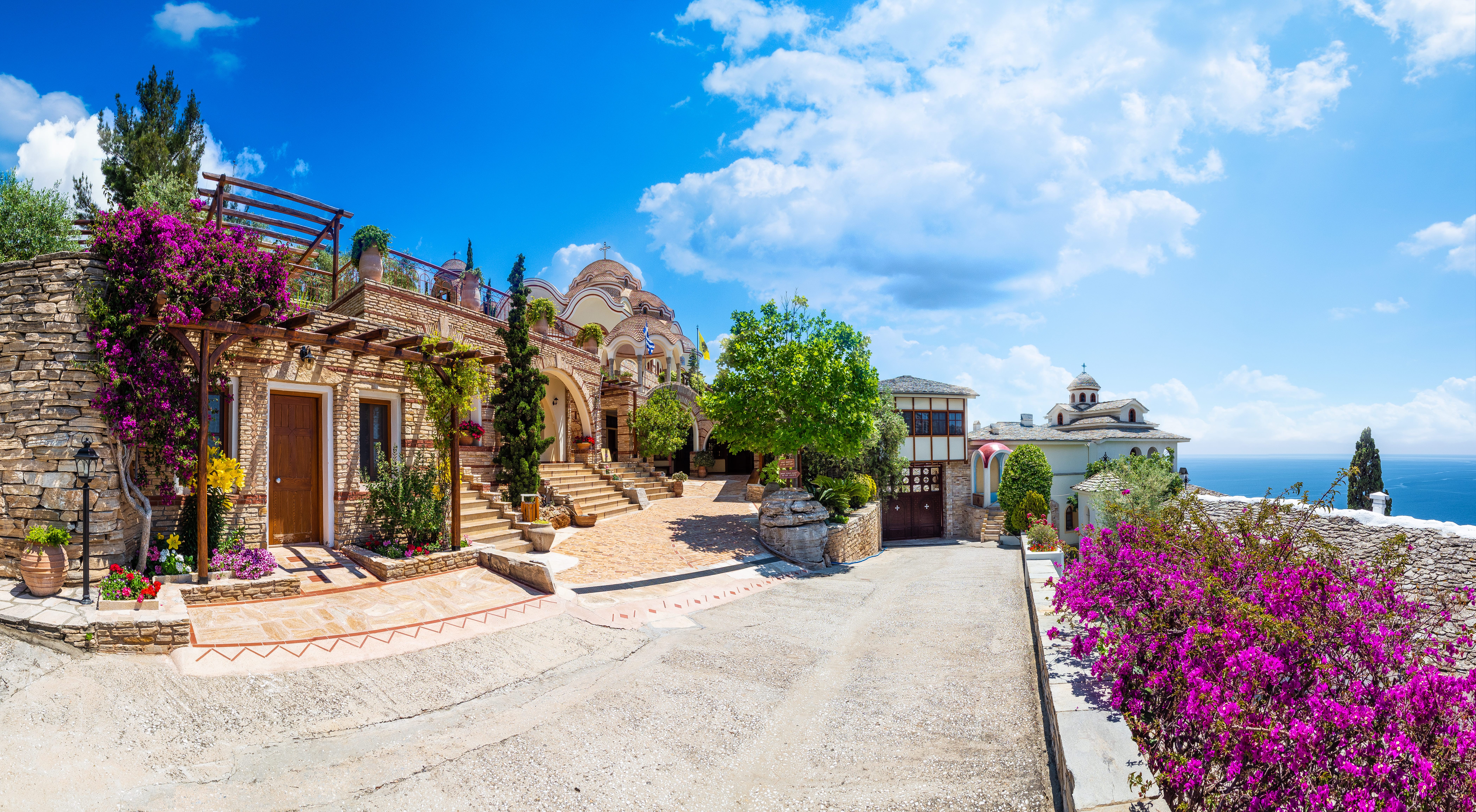 a stone path leading to a house