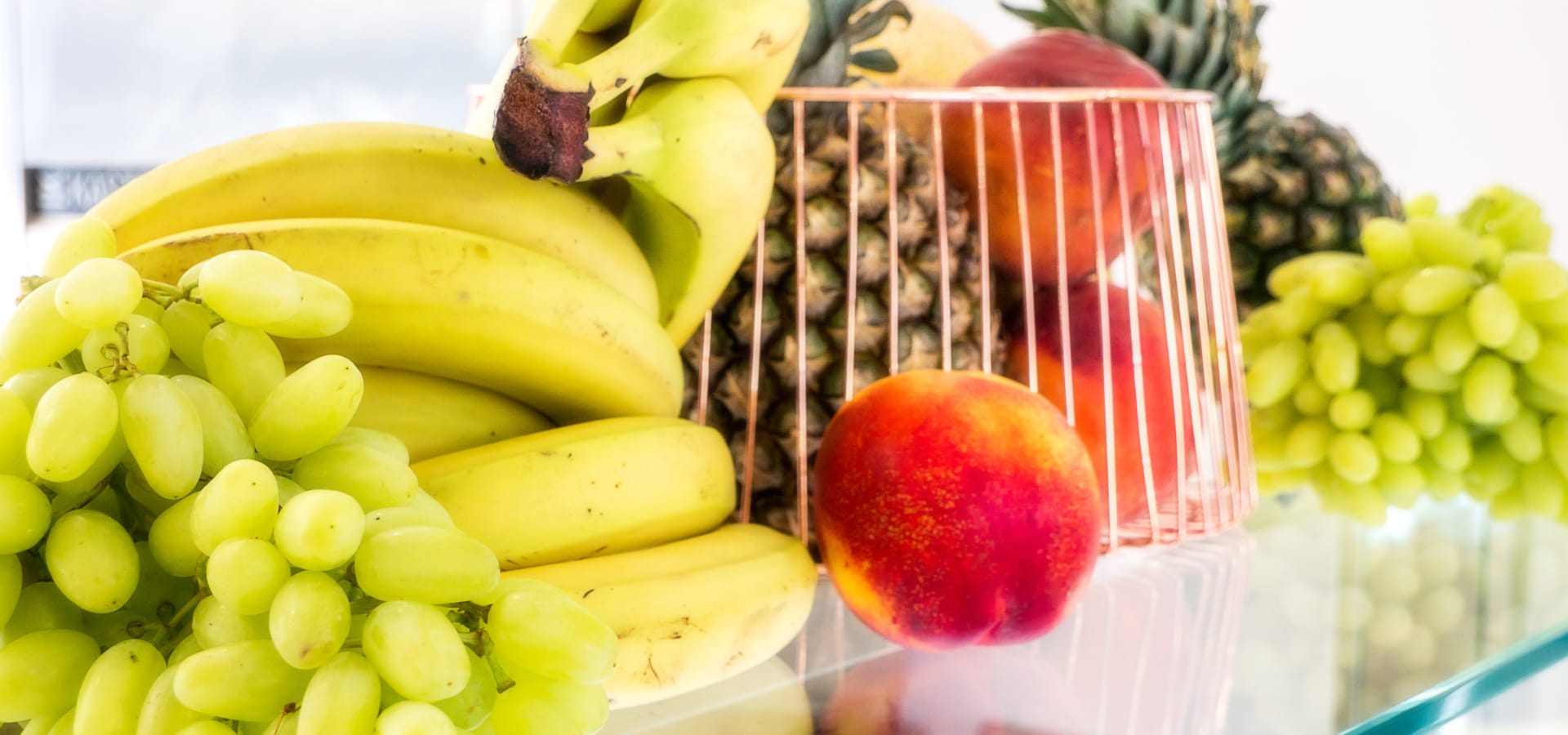 a bunch of bananas and a strawberry