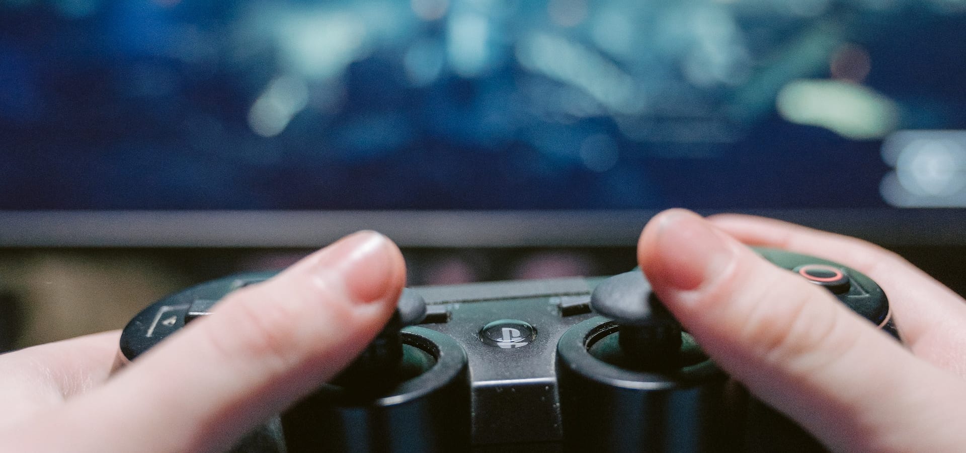a person holding a game controller