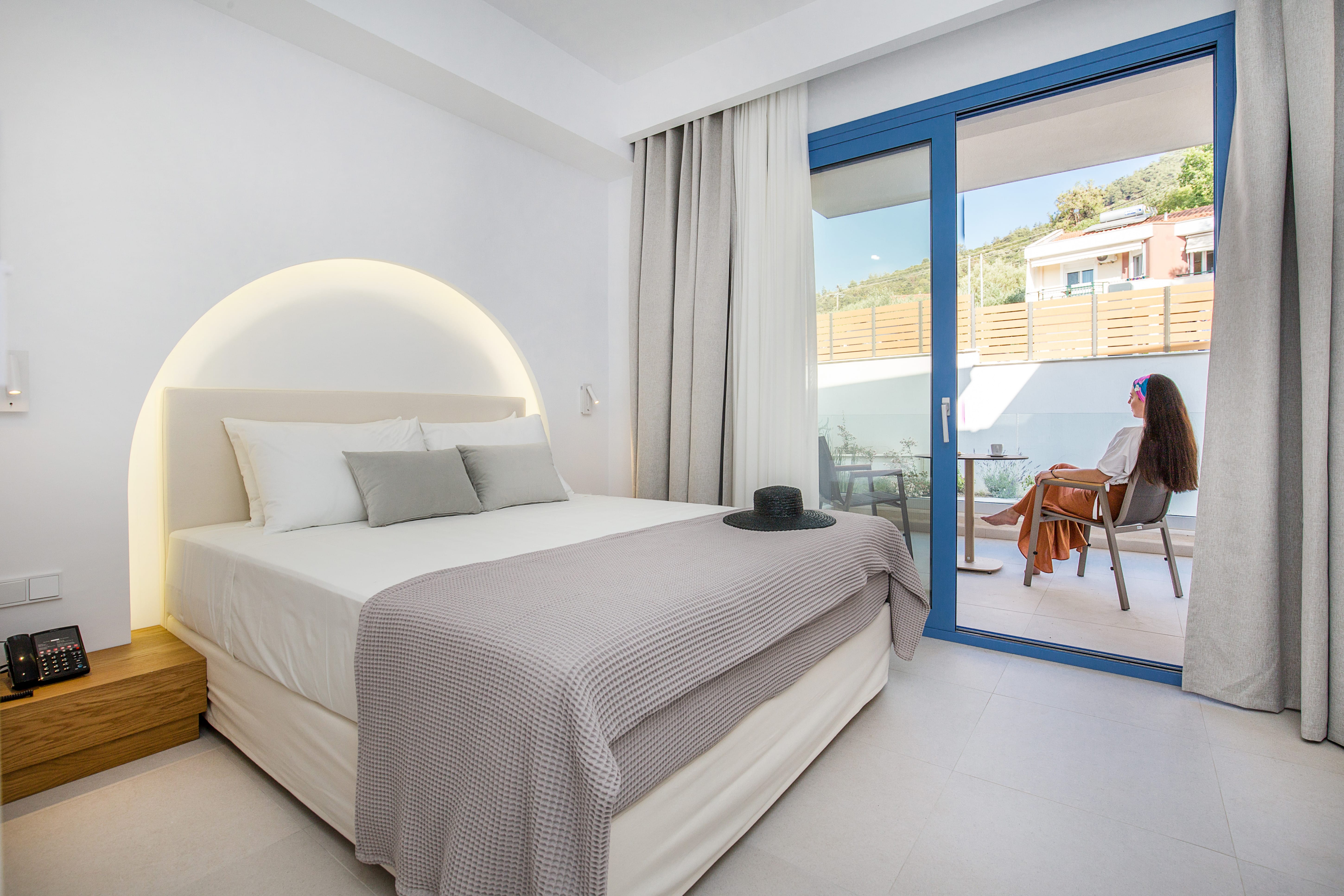 a room with a bed and a window