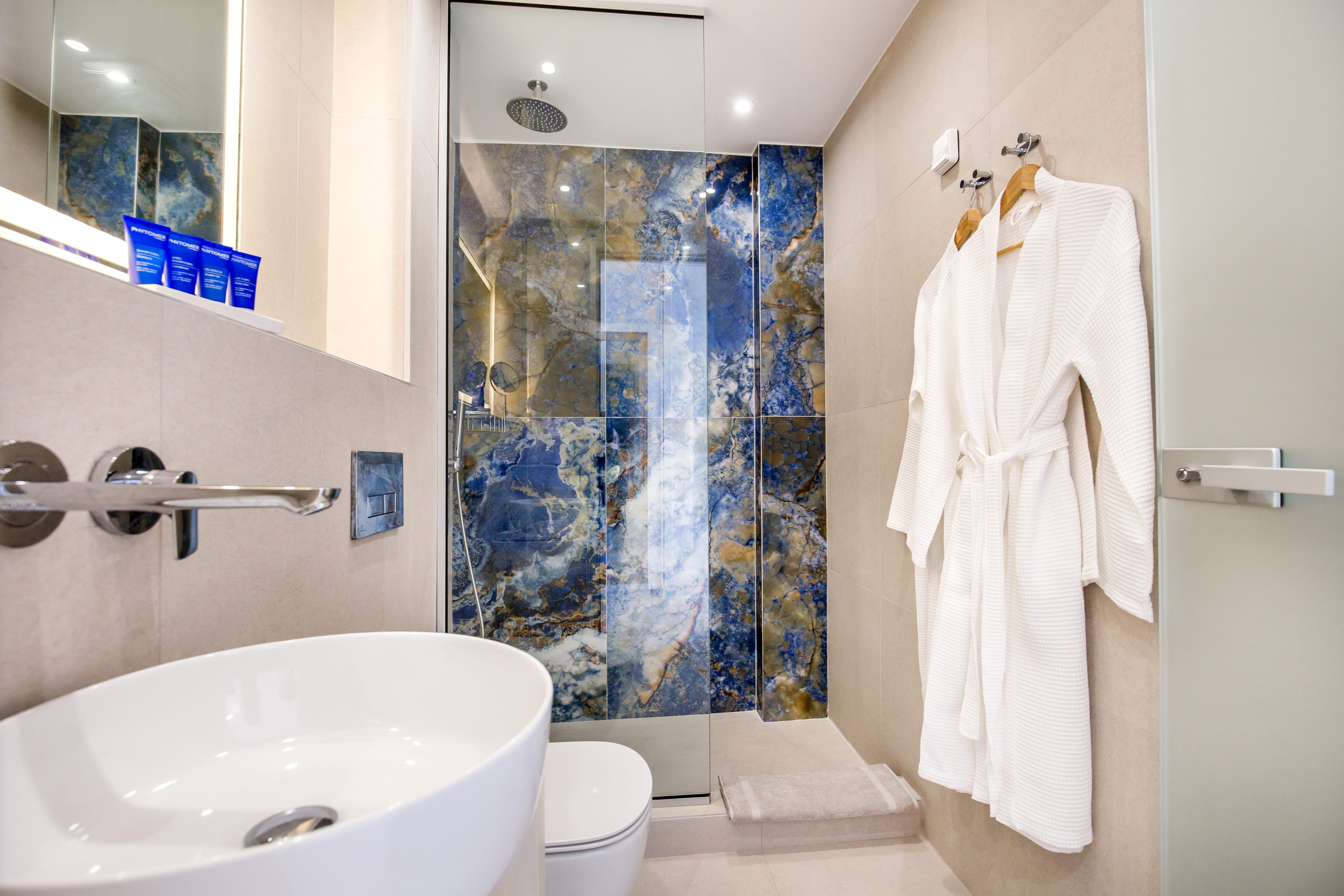 a bathroom with a sink and a shower curtain