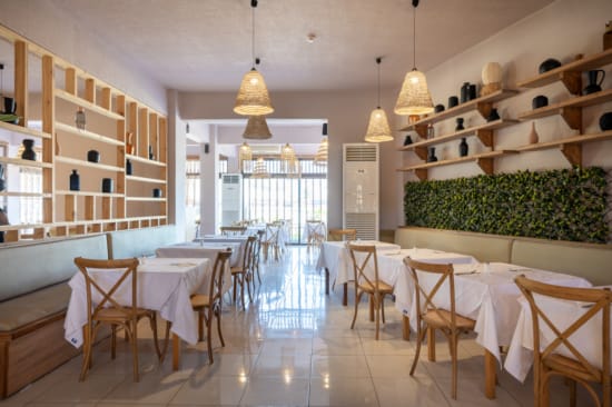 a room with tables and chairs