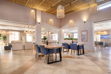 a large room with tables and chairs