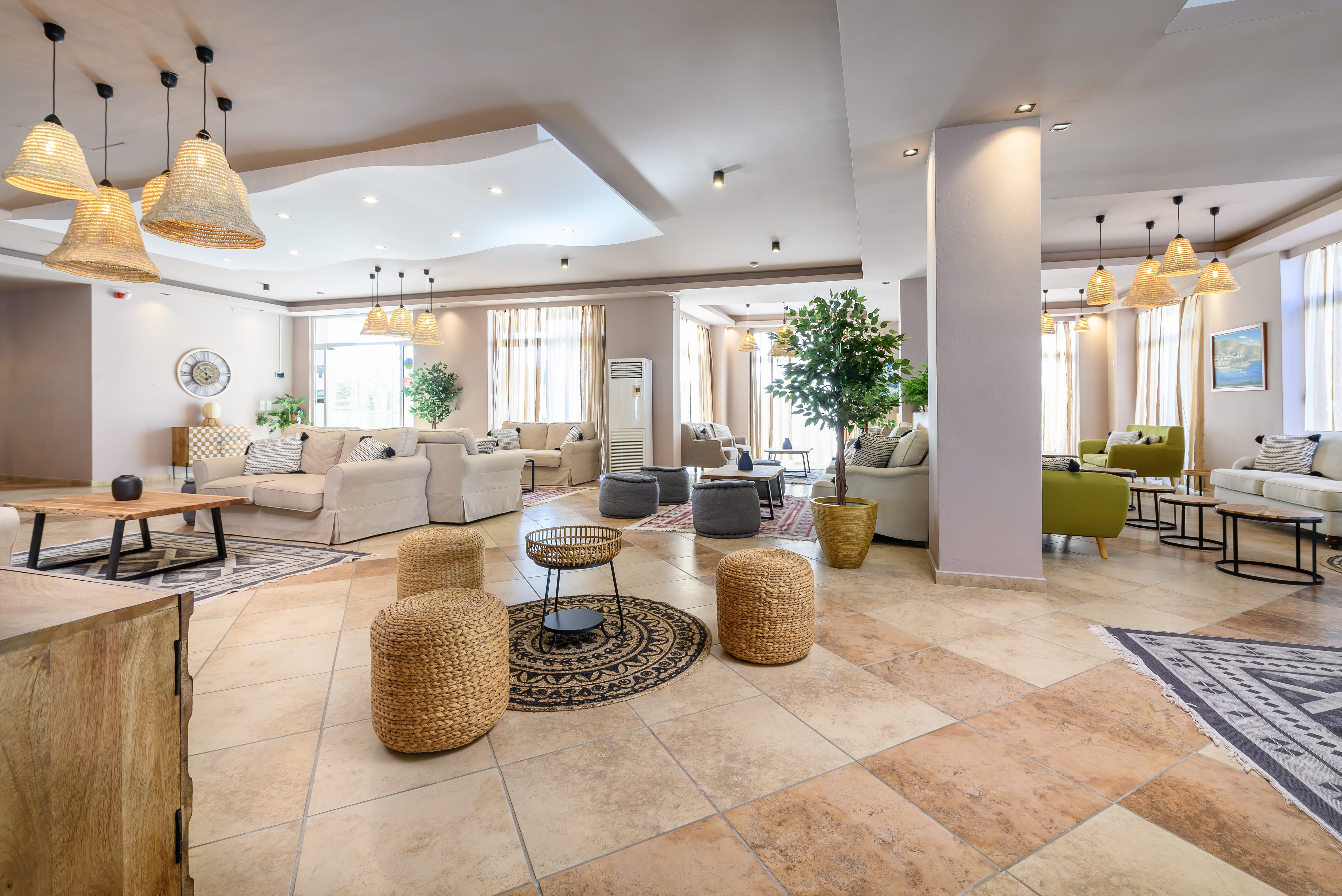 a large room with a large chandelier and a large rug