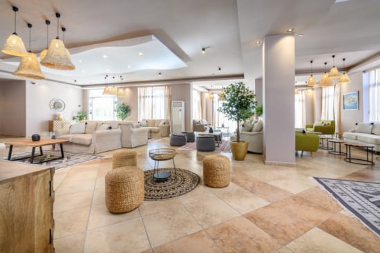 a large room with a large chandelier and a large rug