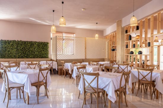 a room with tables and chairs