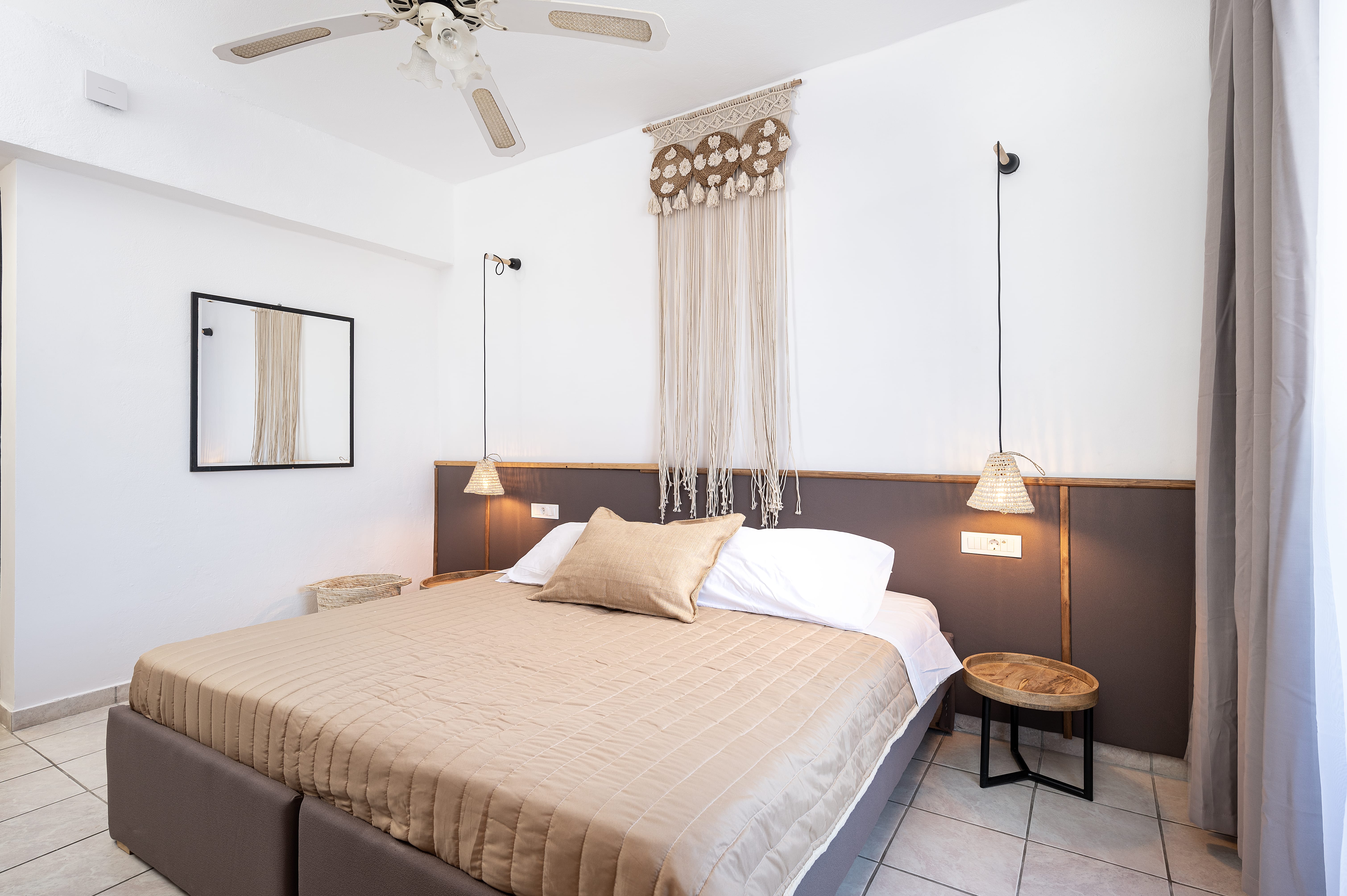 a bedroom with a bed and a table